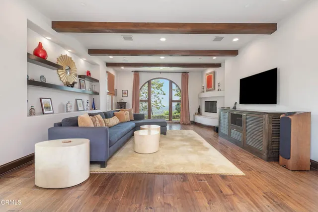 a bed room with bed and a flat screen tv