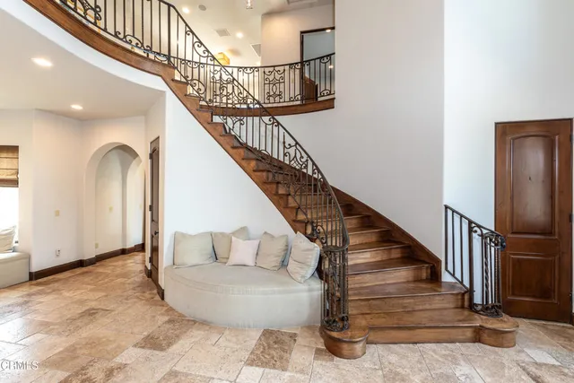 a kitchen with stainless steel appliances granite countertop a sink and cabinets