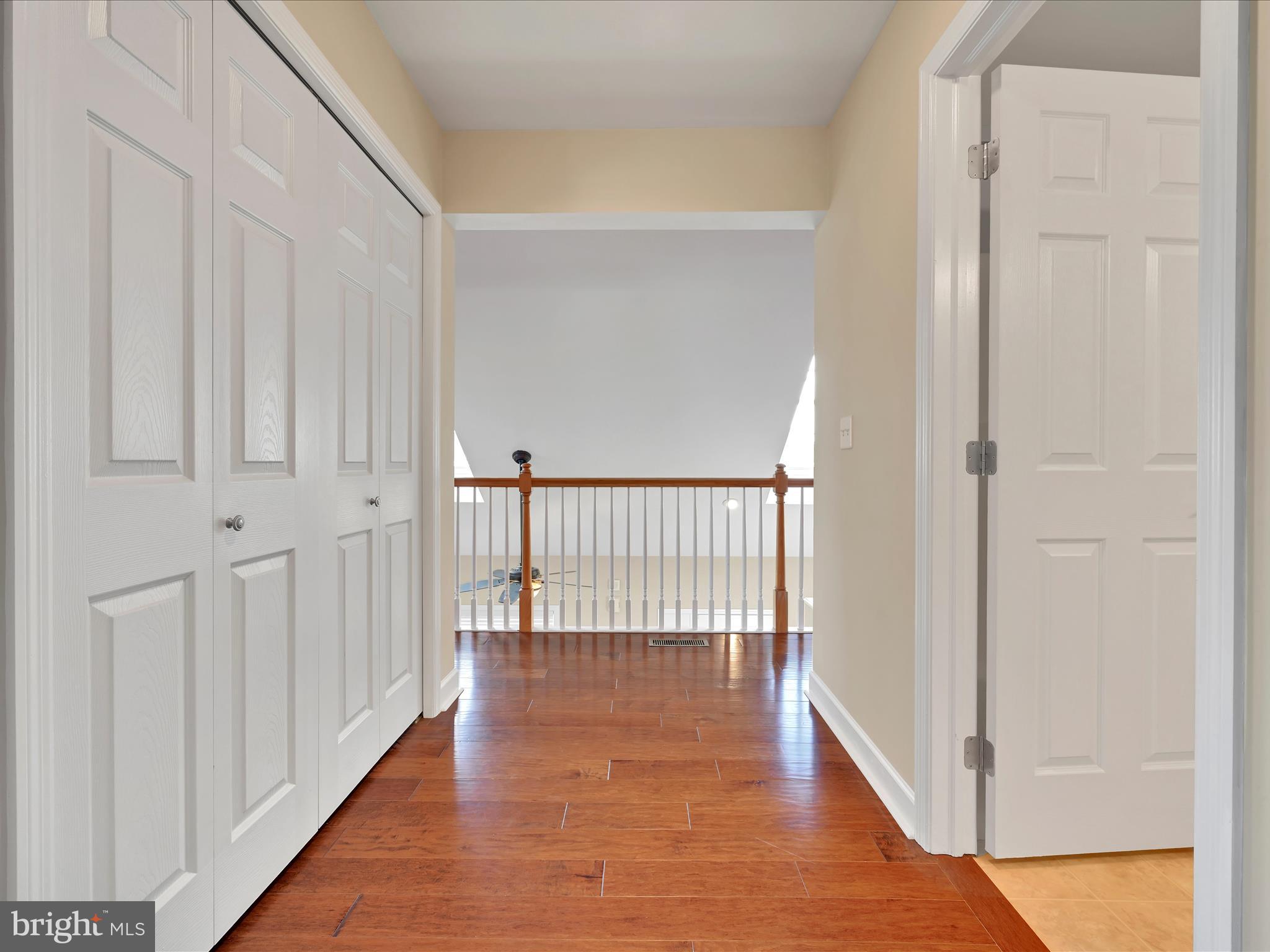 623 Courthouse Circle Lititz, PA 17543 - Photo 19 of 32 a view of a hallway with wooden floor and staircase