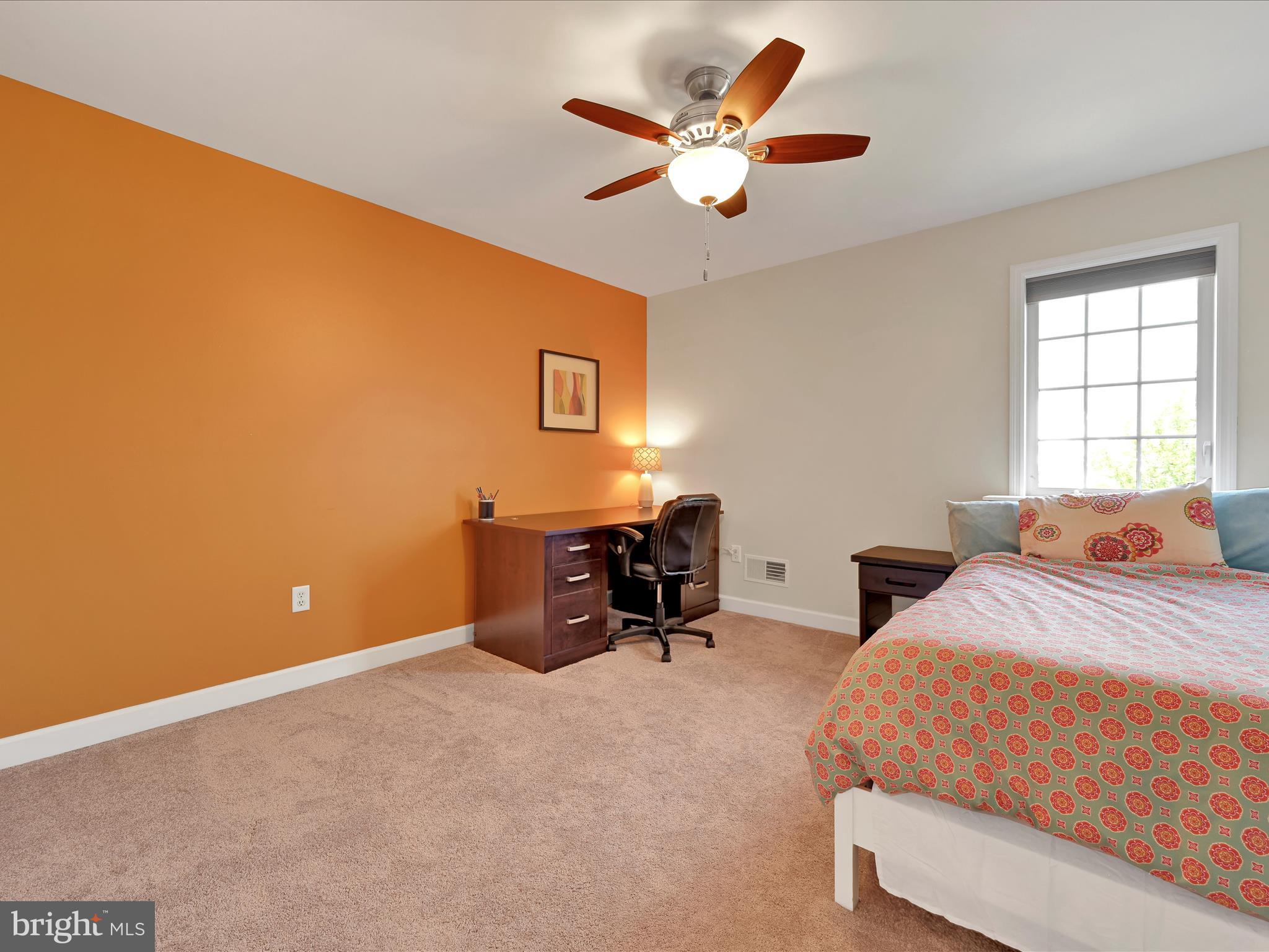 623 Courthouse Circle Lititz, PA 17543 - Photo 24 of 32 a bedroom with bed and a large window
