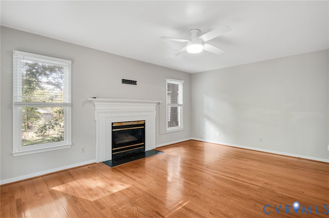 8701 Overhill Road Henrico, VA 23229 - Photo 13 of 35 Unfurnished living room featuring a fireplace with