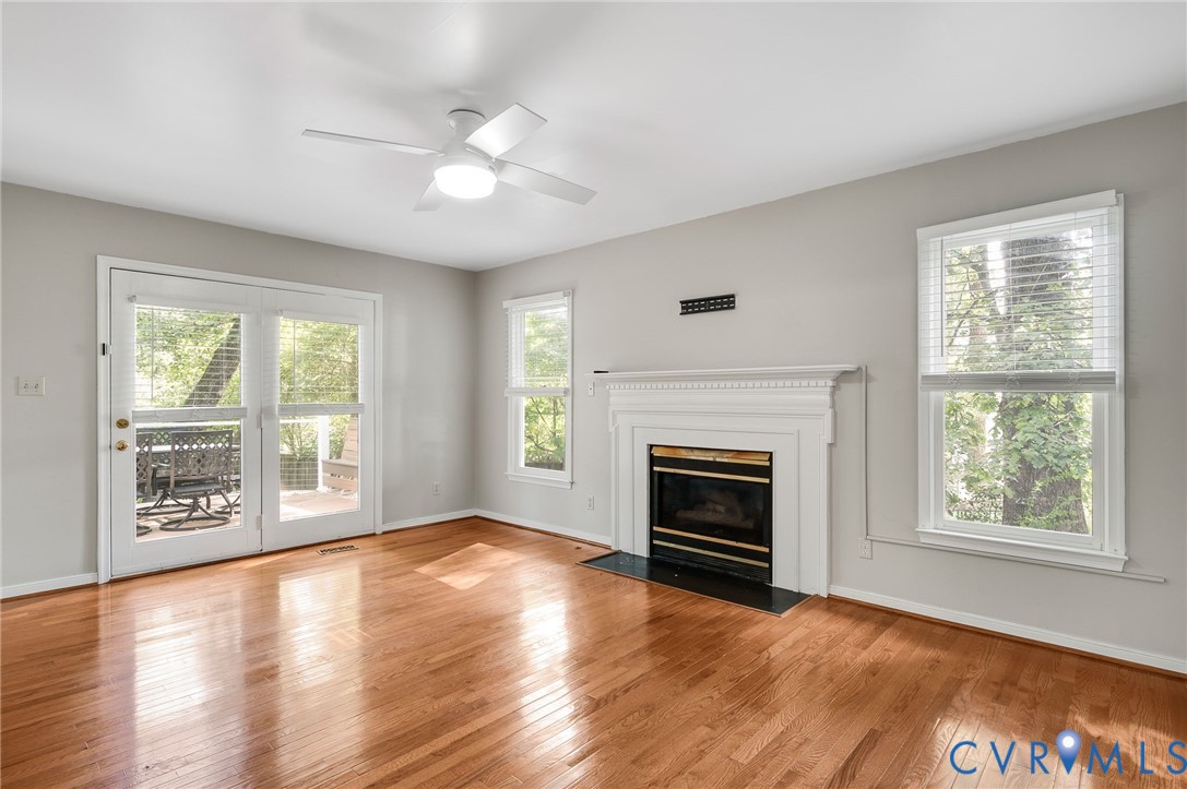 8701 Overhill Road Henrico, VA 23229 - Photo 14 of 35 Unfurnished living room featuring light wood-style