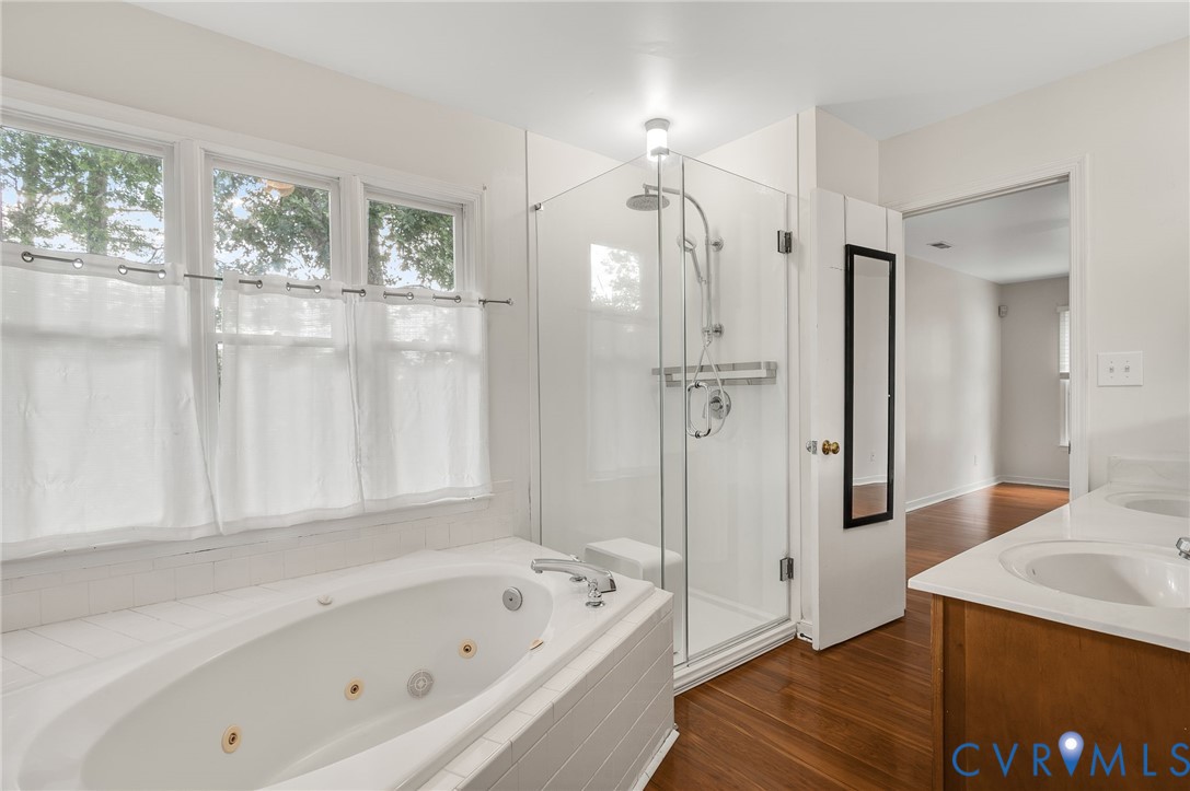 8701 Overhill Road Henrico, VA 23229 - Photo 24 of 35 Bathroom with a stall shower, dark wood-type floor