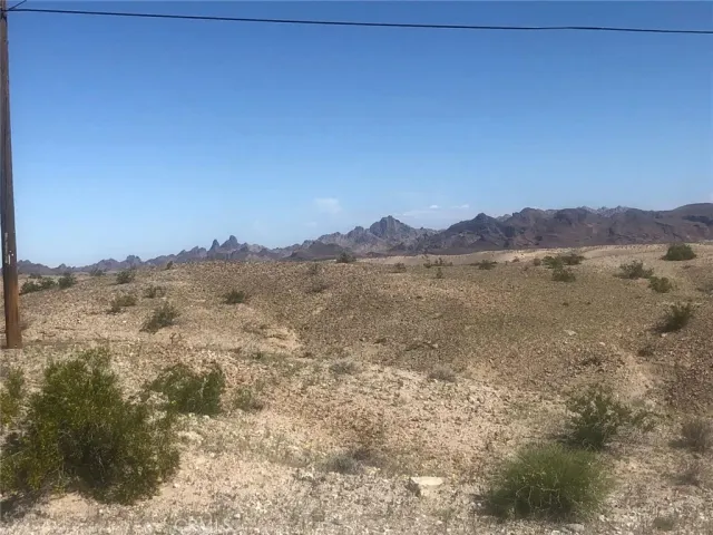 a view of mountain with lake view