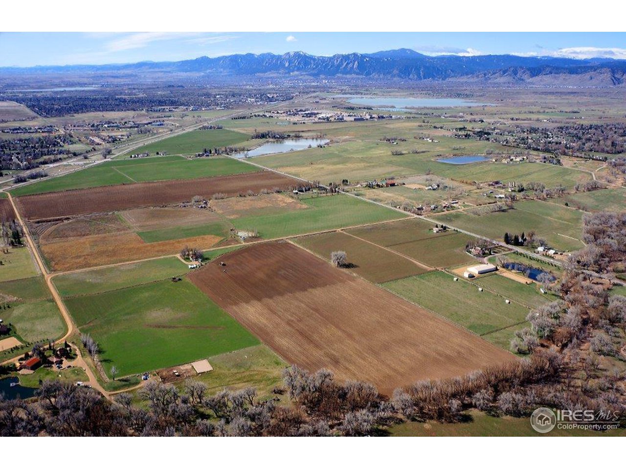 7581 Nimbus Road Longmont, CO 80503 - Photo 2 of 9 a view of a city with an outdoor space