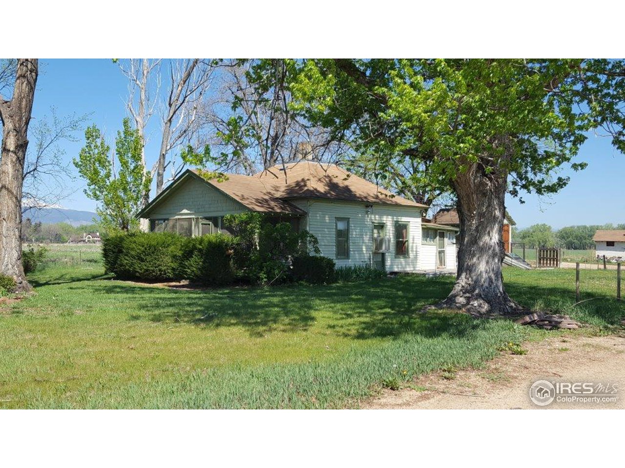 7581 Nimbus Road Longmont, CO 80503 - Photo 4 of 9 a view of a house with a yard