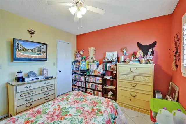 a bedroom with a bed and furniture