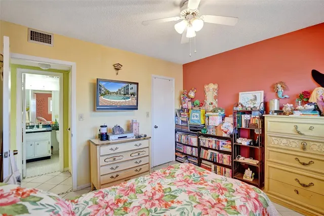 a bedroom with a bed and furniture