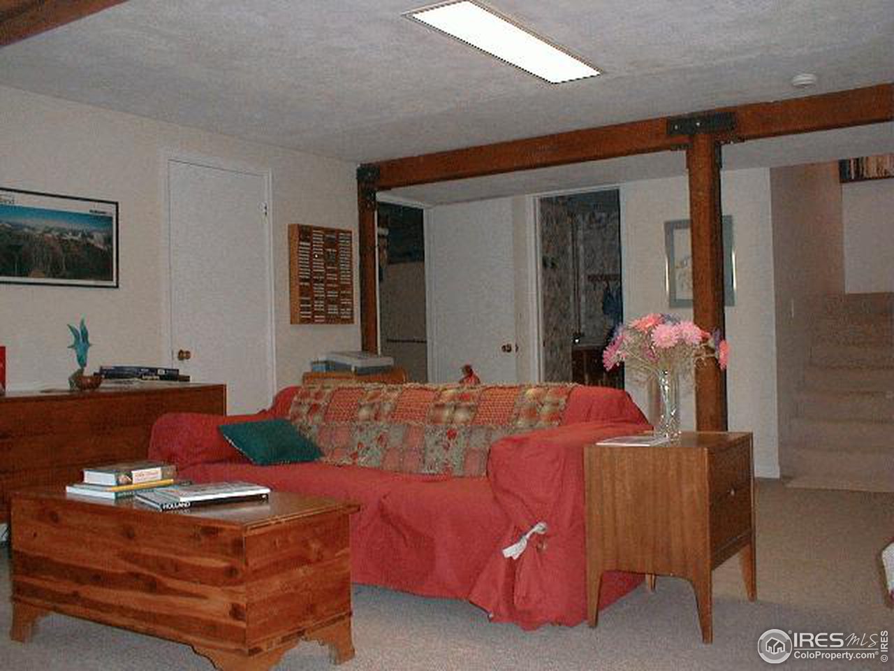 207 East Kelly Road Boulder, CO 80302 - Photo 5 of 10 a living room with furniture and flowers