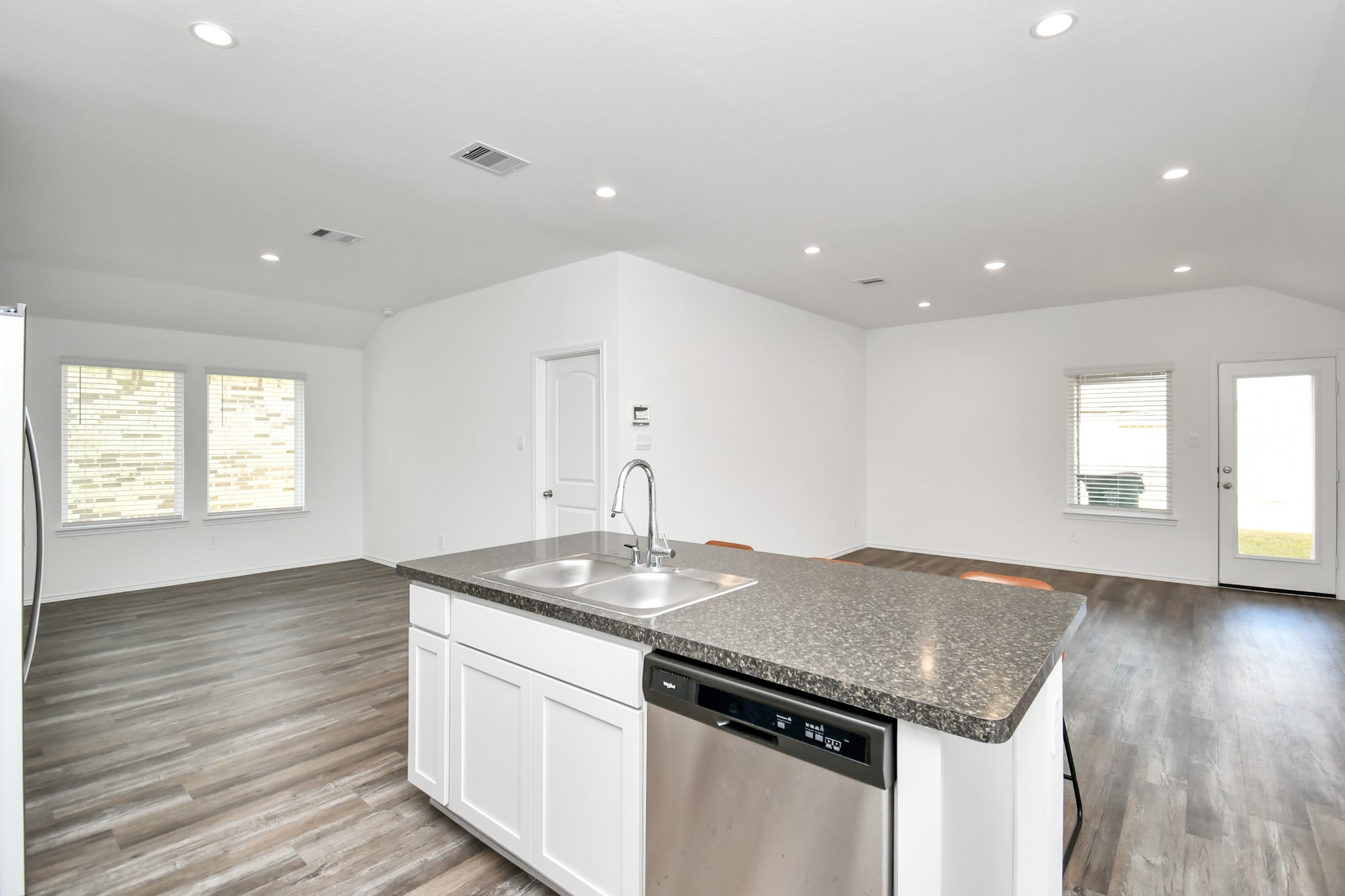 5315 Castlebury Meadows Dr Spring Spring, TX 77373 - Photo 7 of 39 a kitchen with a sink stove and cabinets