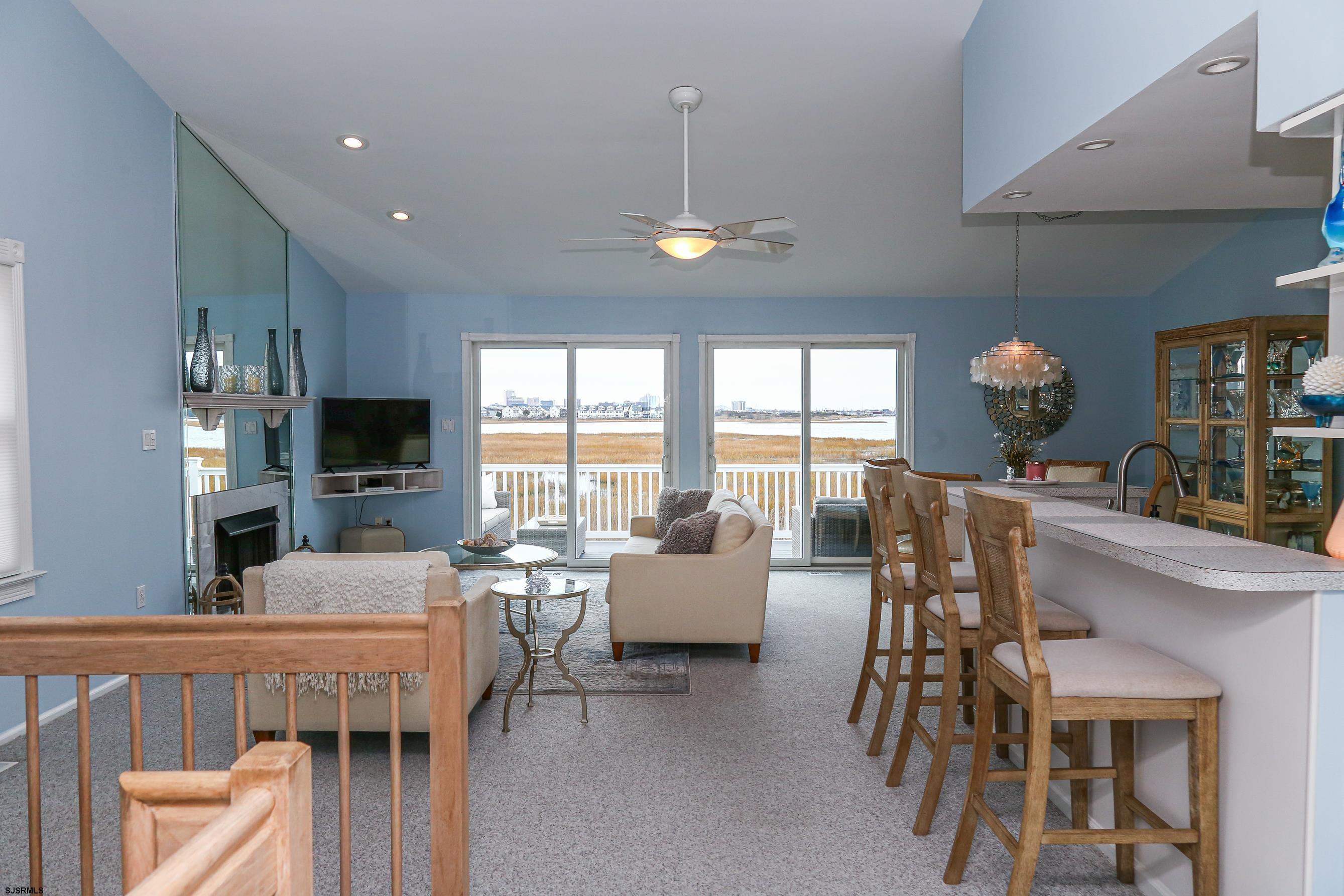 12 Gull Cove Brigantine, NJ 08203 - Photo 2 of 50 a view of a dining room with furniture window and outside view