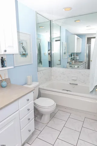 a view of a balcony with wooden floor and city view