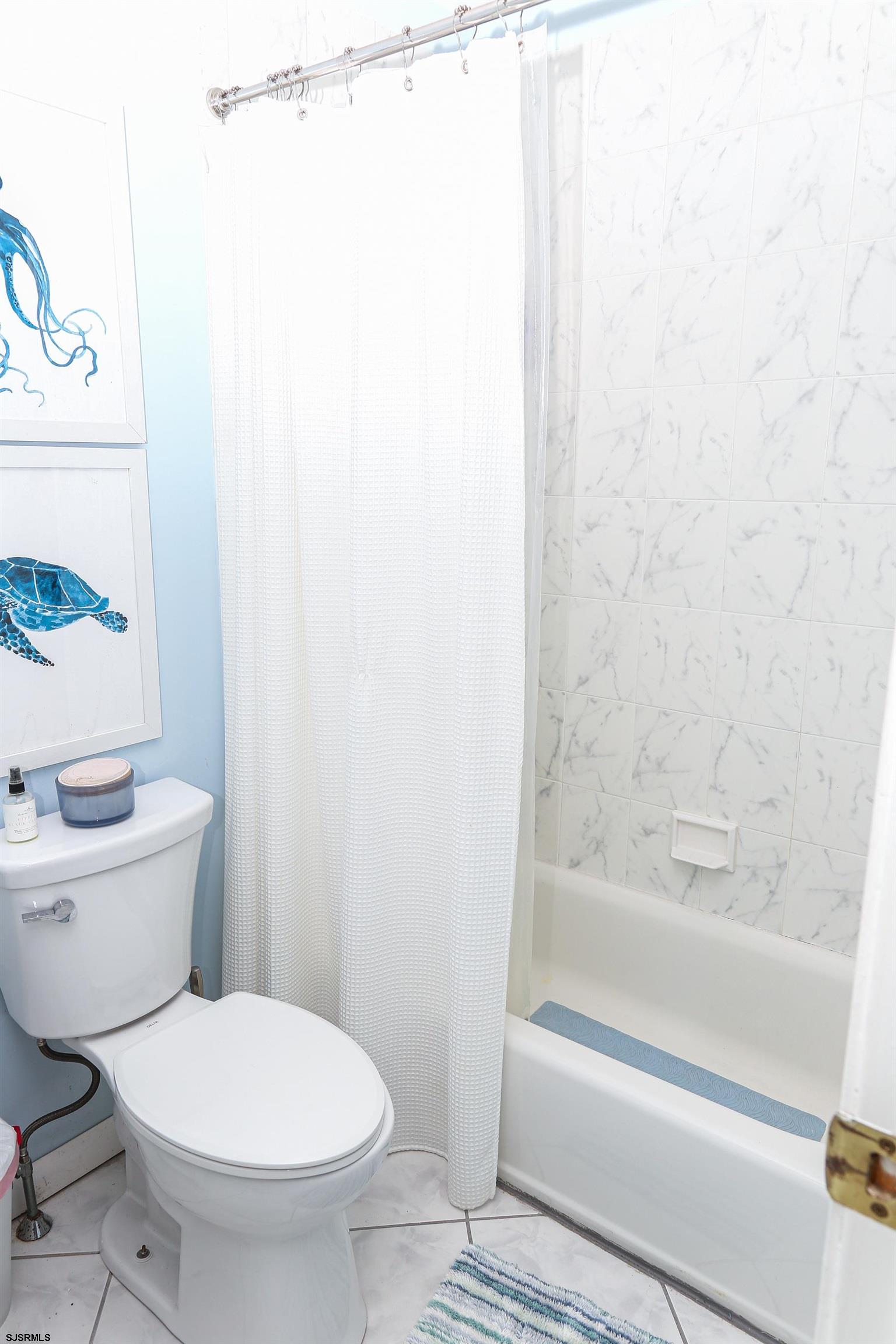 12 Gull Cove Brigantine, NJ 08203 - Photo 25 of 50 a bathroom with a toilet and a bathtub