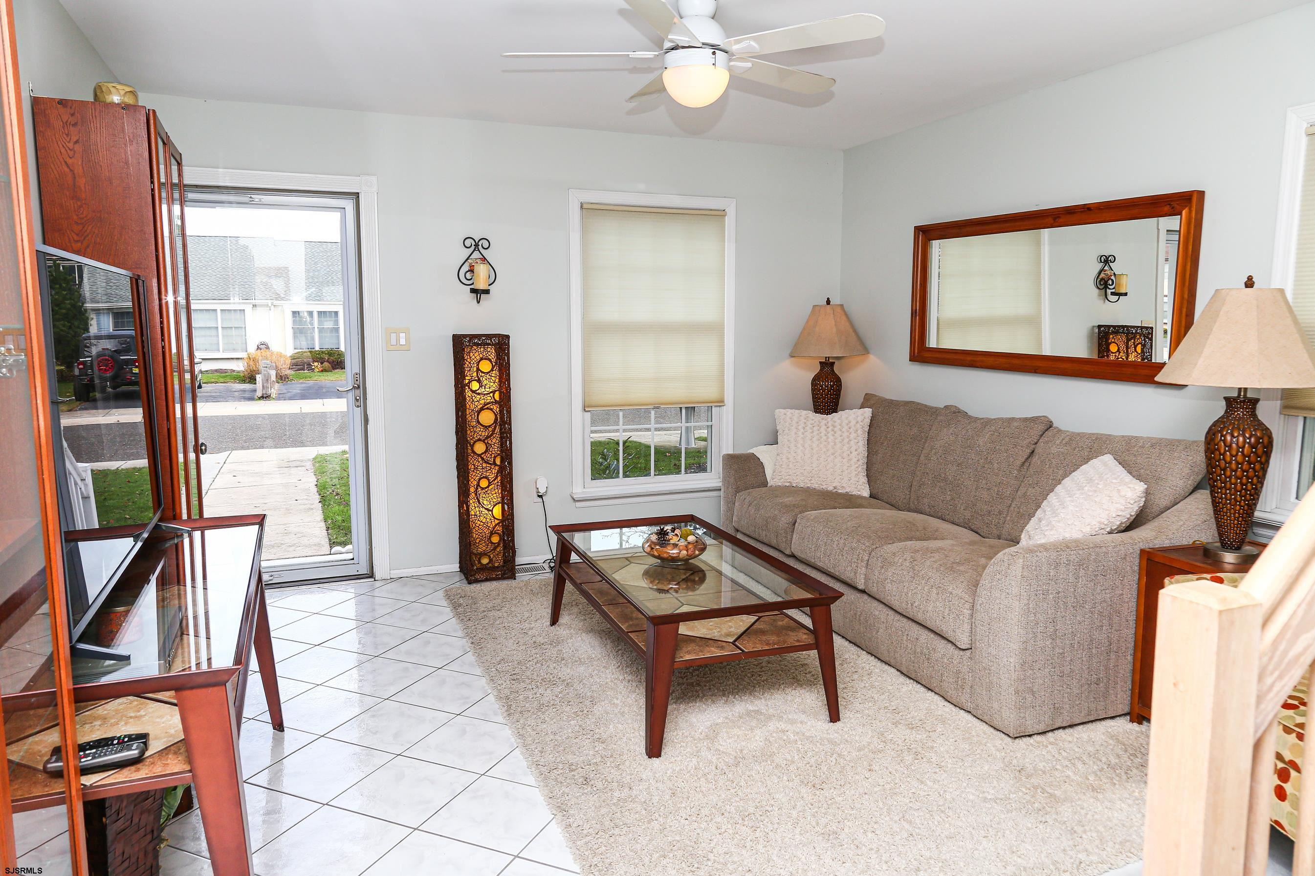 12 Gull Cove Brigantine, NJ 08203 - Photo 33 of 50 a living room with furniture and a window