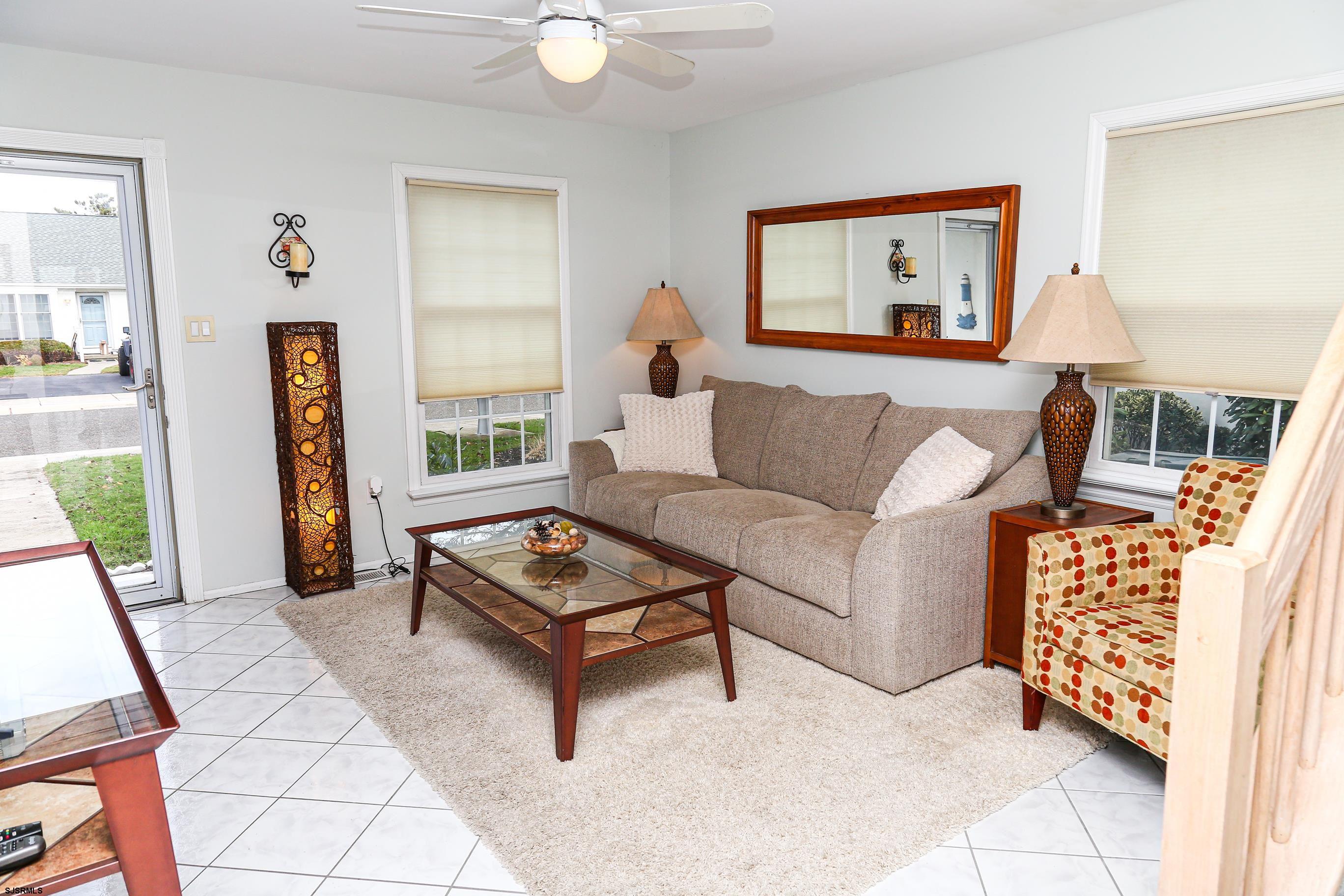 12 Gull Cove Brigantine, NJ 08203 - Photo 34 of 50 a living room with furniture and a window