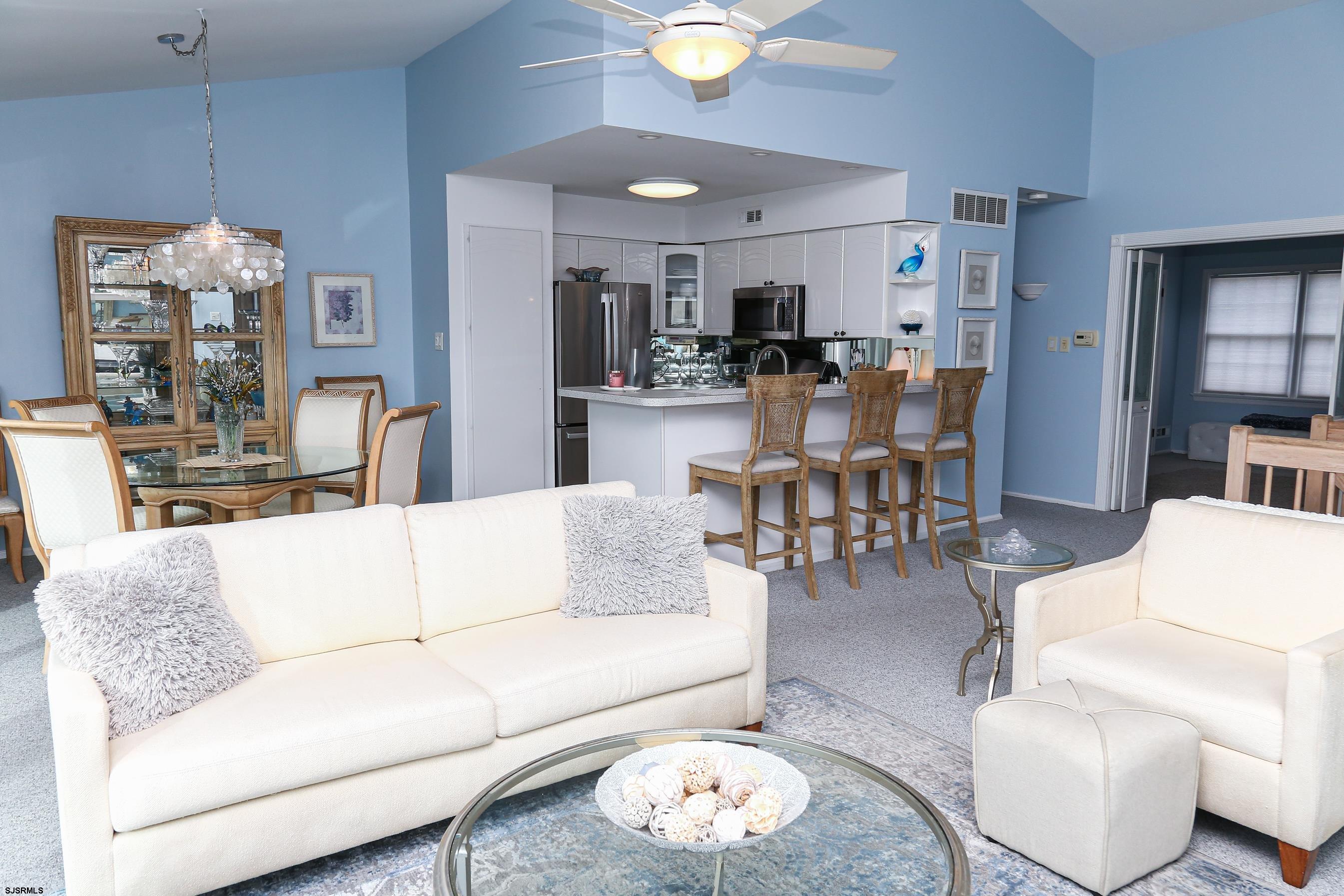 12 Gull Cove Brigantine, NJ 08203 - Photo 10 of 50 a living room with furniture and kitchen view