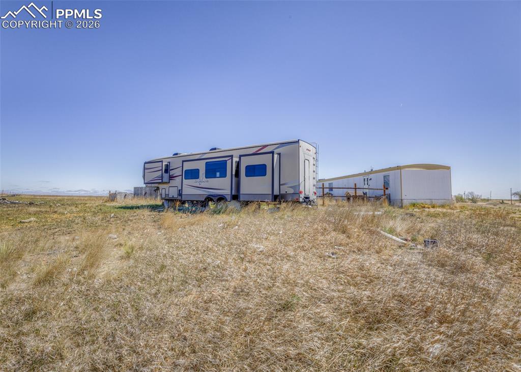 40250 Hoot Owl Road Ramah, CO 80832 - Photo 4 of 12 a house view with a garden space