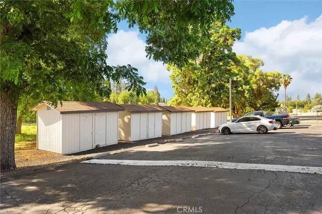 a view of a swimming pool with an outdoor space and seating area