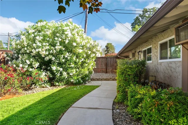 a backyard of a house with lots of green space