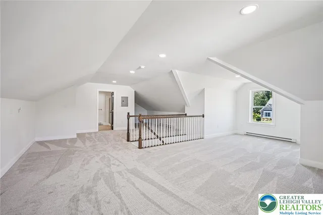 a view of a hallway with workspace