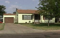 4415 South Lipscomb Street Amarillo, TX 79110 - Photo 1 of 1 front view of a house with a yard