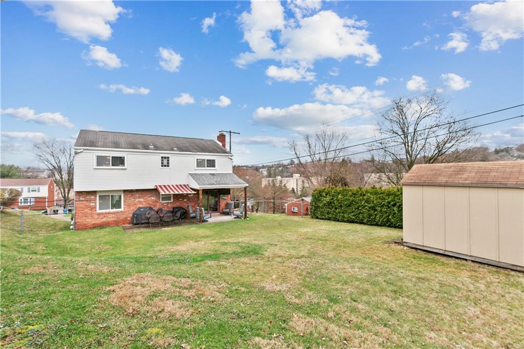 5140 Raintree Drive Pittsburgh, PA 15236 - Photo 25 of 26 a view of a yard with cars parked in front of it