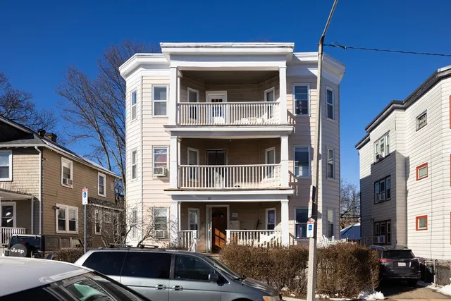 a front view of a house with a balcony