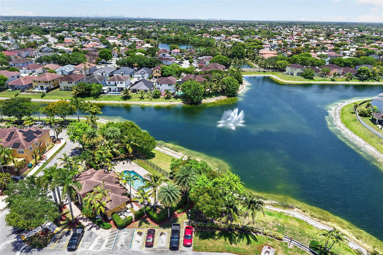 16651 Southwest 79th Terrace Miami, FL 33193 - Photo 32 of 34 an aerial view of a house with a lake view