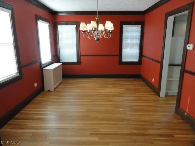 1585 Rydalmount Road Cleveland Heights, OH 44118 - Photo 5 of 24 Ohio City colors, elegant woodwork, chair molding, crown molding. Warm radiator heat.