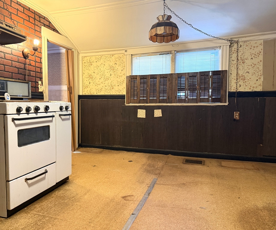 386 June Street Worcester, MA 01602 - Photo 4 of 16 a view of a kitchen with a stove