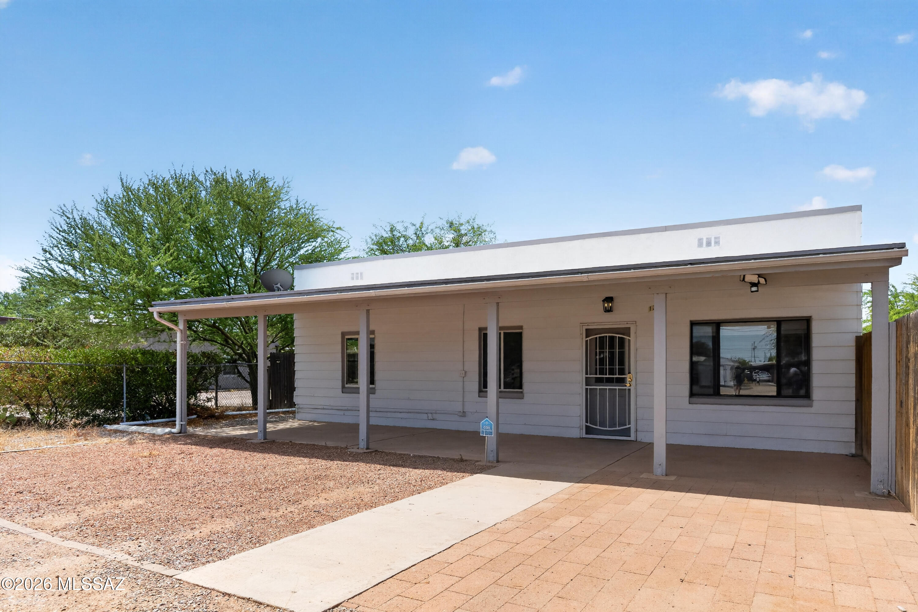 131 West Pastime Road Tucson, AZ 85705 - Photo 1 of 18 Front of the house is set back far from the quiet street.