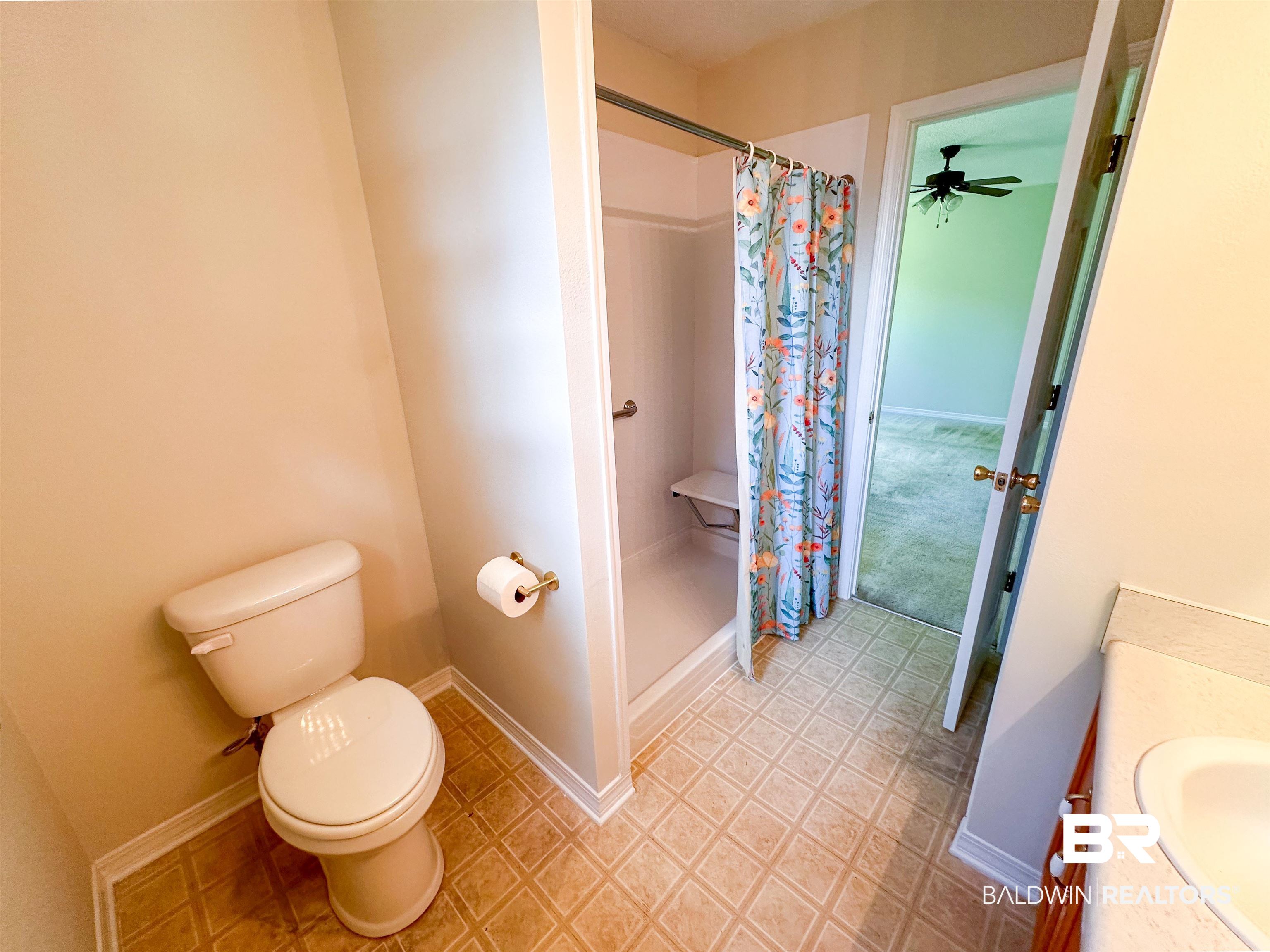 13255 Pointer Drive West Foley, AL 36535 - Photo 17 of 25 Bathroom featuring tile patterned flooring, toilet, vanity, and ceiling fan