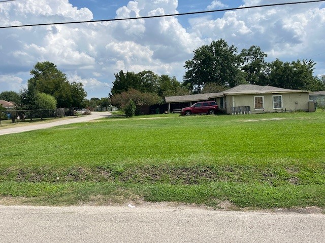 0 Firefly Street Houston, TX 77017 - Photo 2 of 4 a front view of a house with garden