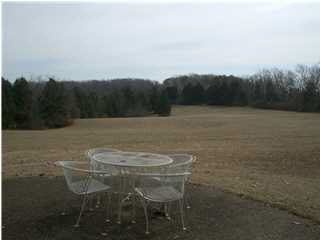 2011 Catlin Road Charlottesville, VA 22901 - Photo 1 of 7 a terrace with a table and chairs