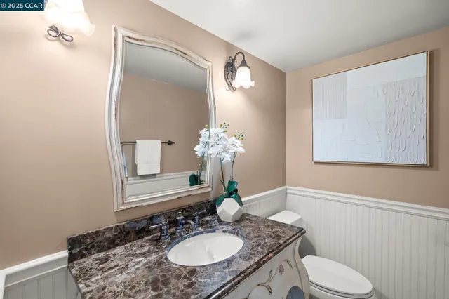 a bed room with a bed window and a night stand