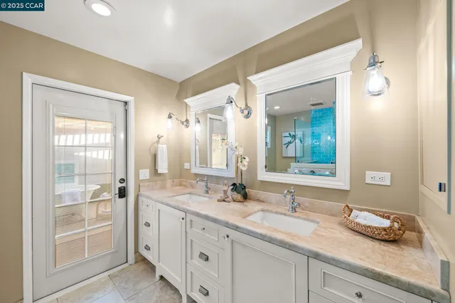 a bathroom with a shower and a mirror