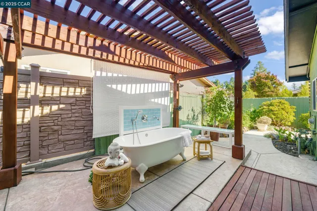 a view of balcony with a potted plant