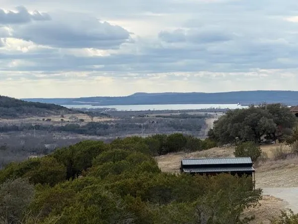 a view of a lake with a mountain in the back