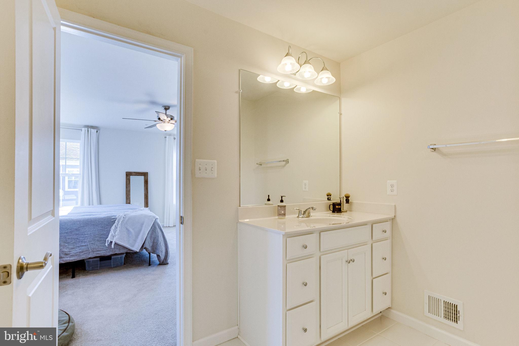 2737 Pinebrook Road Landover, MD 20785 - Photo 17 of 23 Main bathroom with main bedroom in background