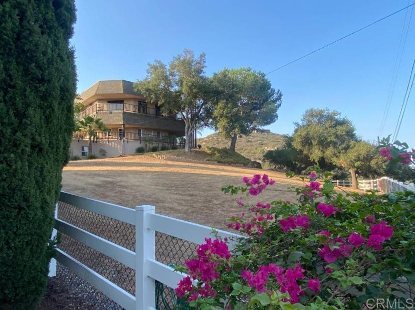 2426 Suncrest Boulevard, Unit B El Cajon, CA 92021 - Photo 1 of 17 a view of a house with a yard and tree s
