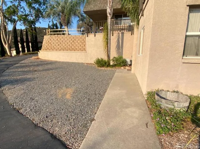 a view of a house with a street
