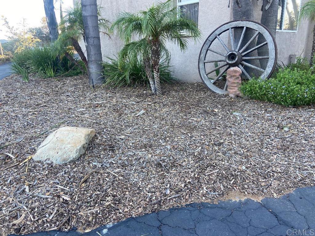 2426 Suncrest Boulevard, Unit B El Cajon, CA 92021 - Photo 15 of 17 a front view of a house with garden