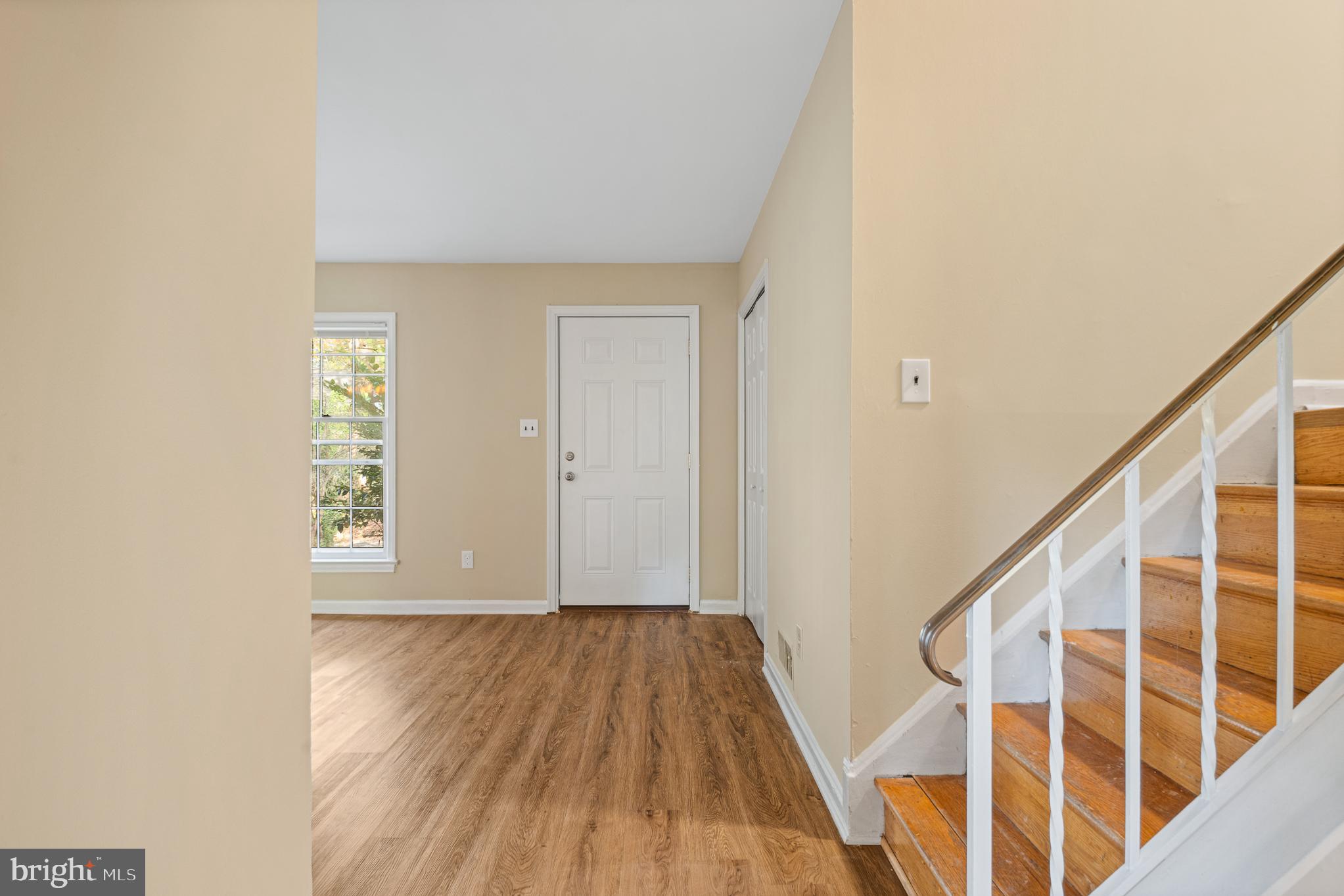 9713 Byeforde Road Kensington, MD 20895 - Photo 12 of 56 a view of front door with wooden floor