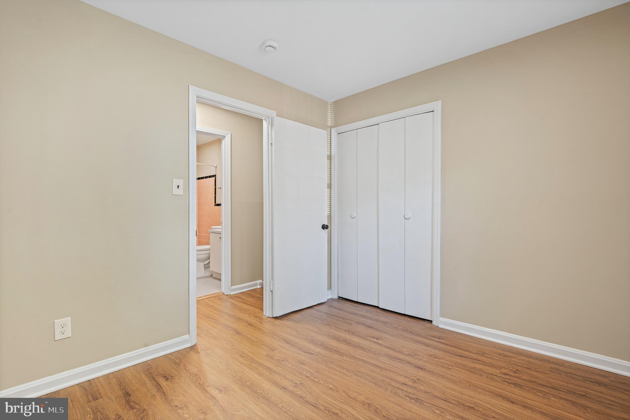 9713 Byeforde Road Kensington, MD 20895 - Photo 22 of 56 a view of an empty room with wooden floor