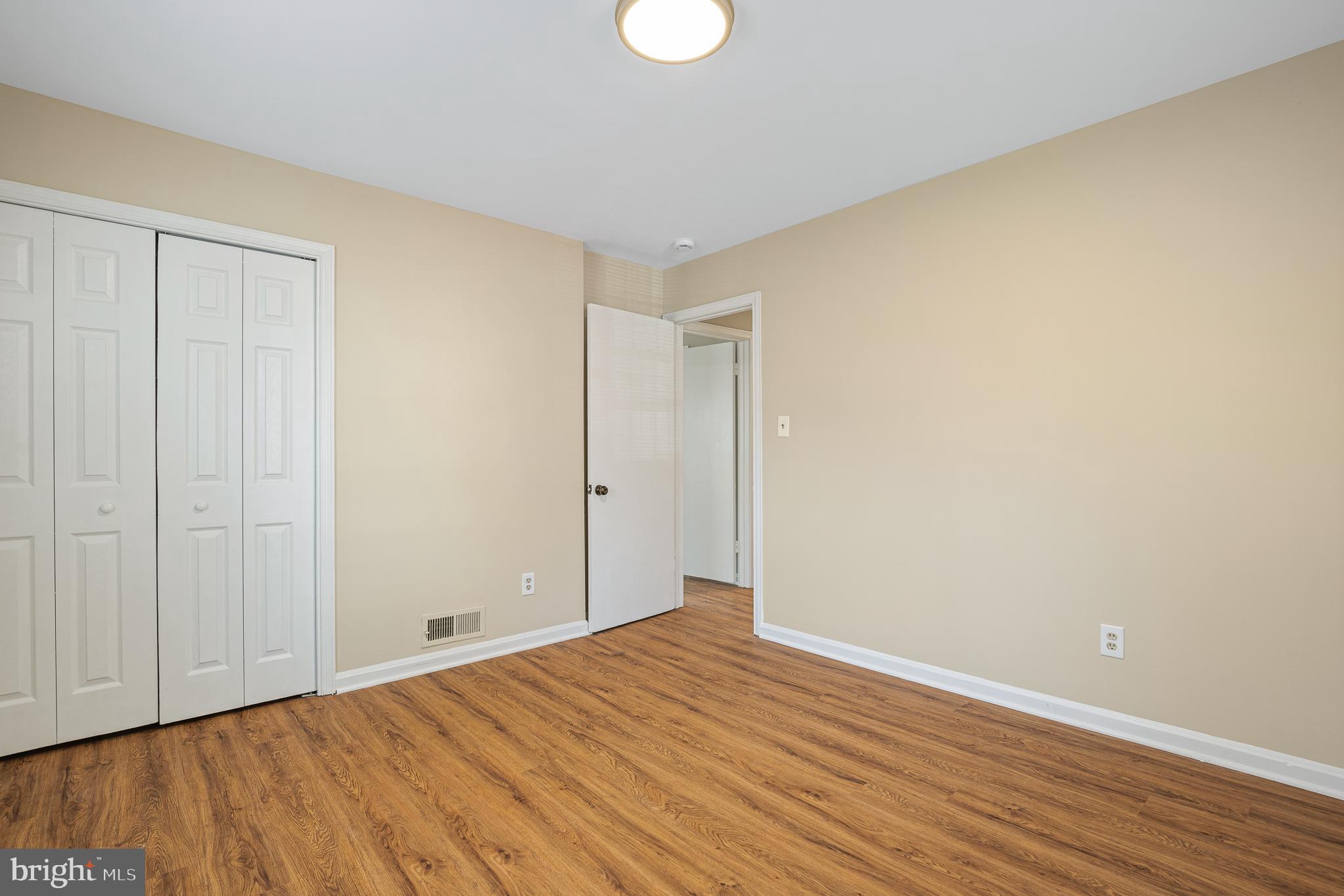 9713 Byeforde Road Kensington, MD 20895 - Photo 28 of 56 a view of room with wooden floor