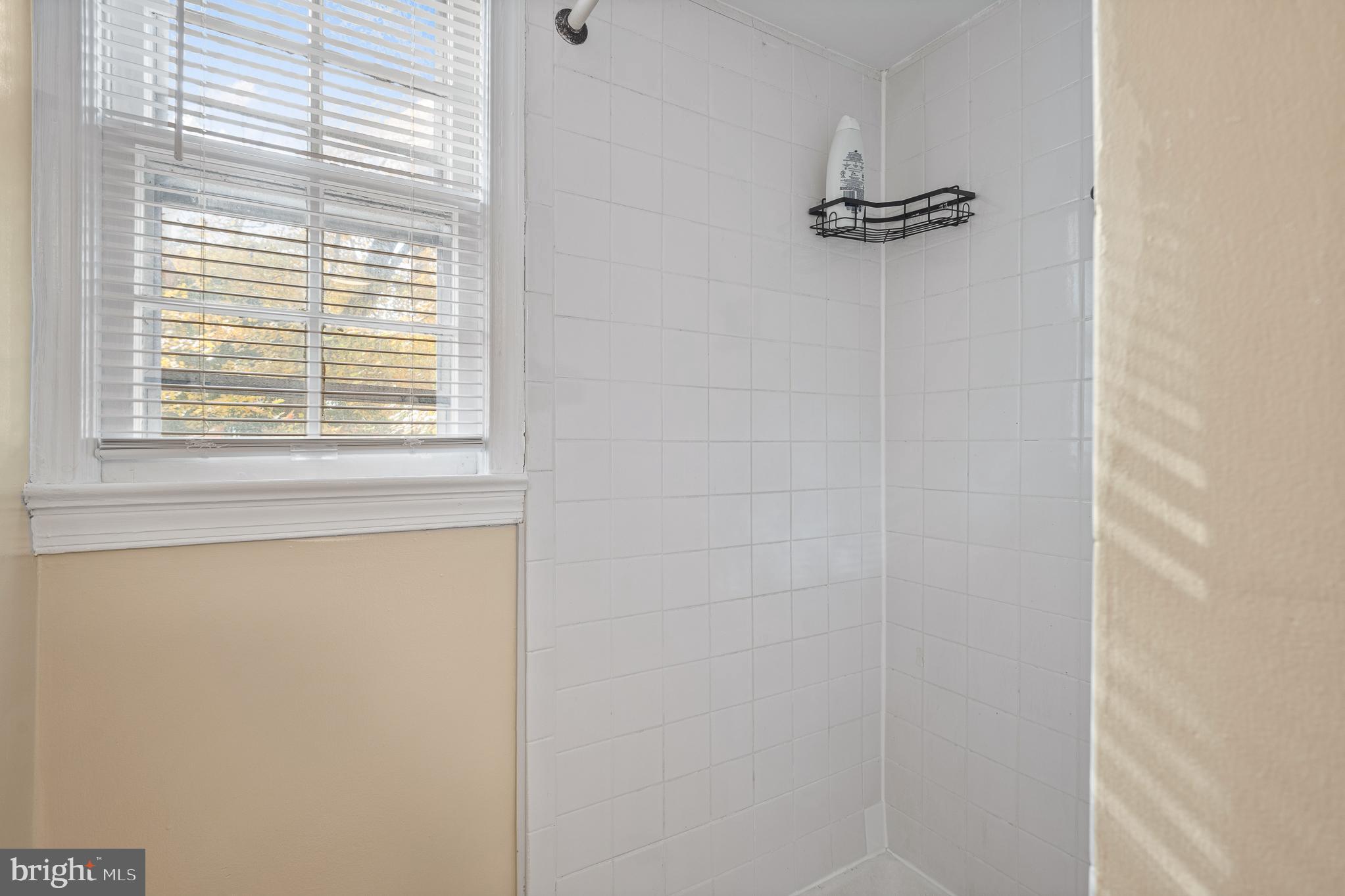 9713 Byeforde Road Kensington, MD 20895 - Photo 39 of 56 a view of a small space with a window