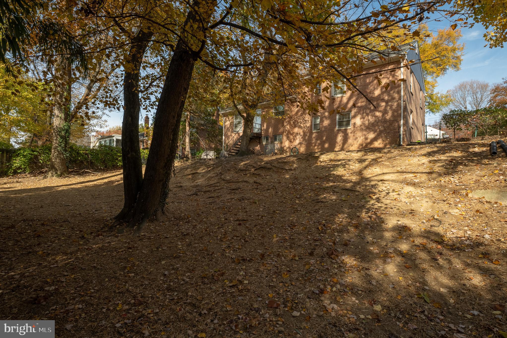 9713 Byeforde Road Kensington, MD 20895 - Photo 56 of 56 a view of outdoor space with trees