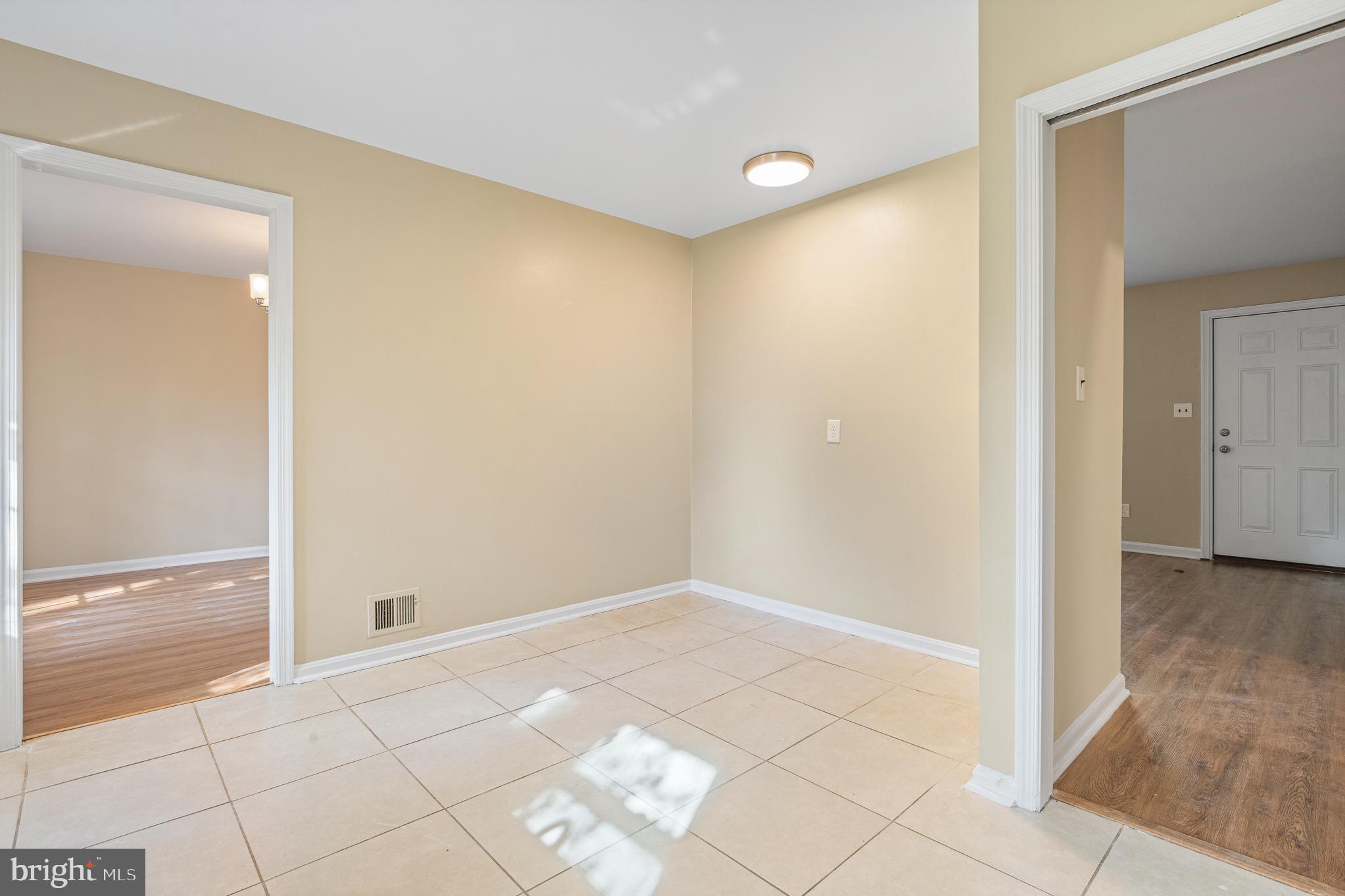 9713 Byeforde Road Kensington, MD 20895 - Photo 10 of 56 a view of an empty room