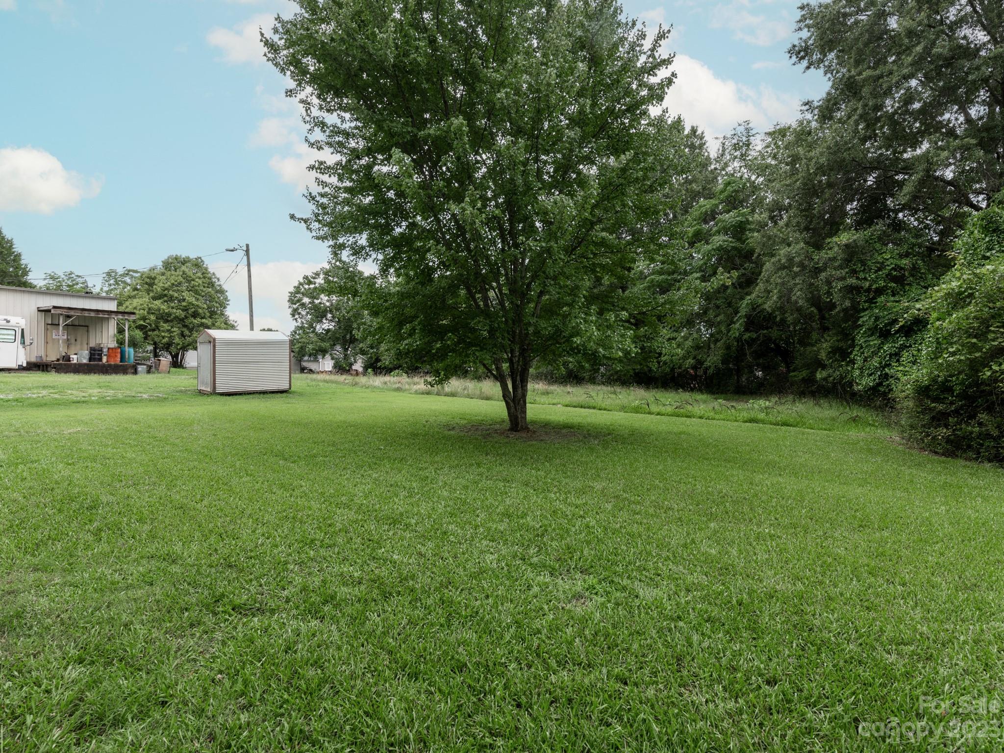 342 Union Cemetery Road Southwest Concord, NC 28027 - Photo 24 of 30 a view of a garden with a house