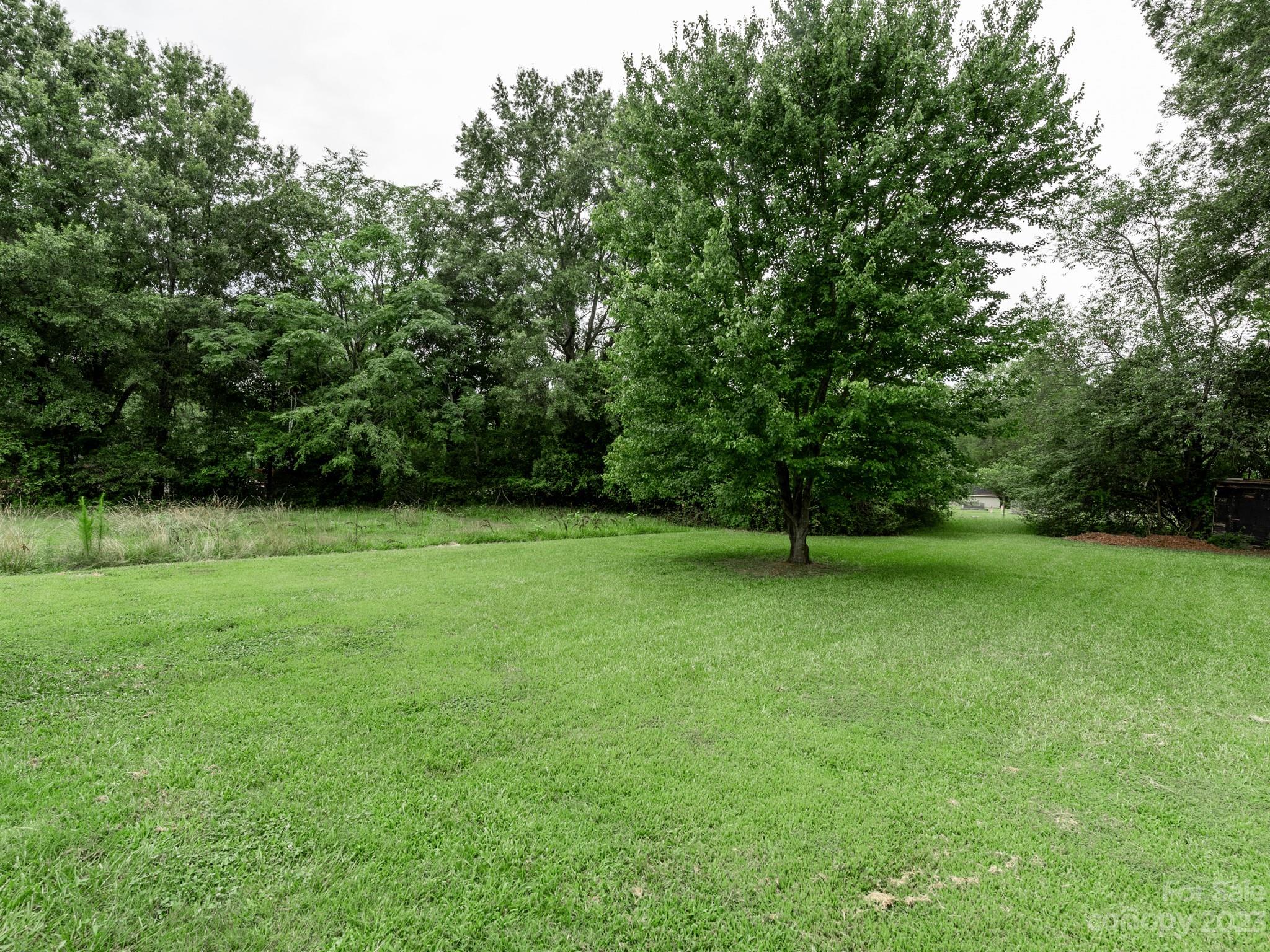 342 Union Cemetery Road Southwest Concord, NC 28027 - Photo 27 of 30 a view of a green yard